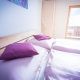 Violettes Schlafzimmer